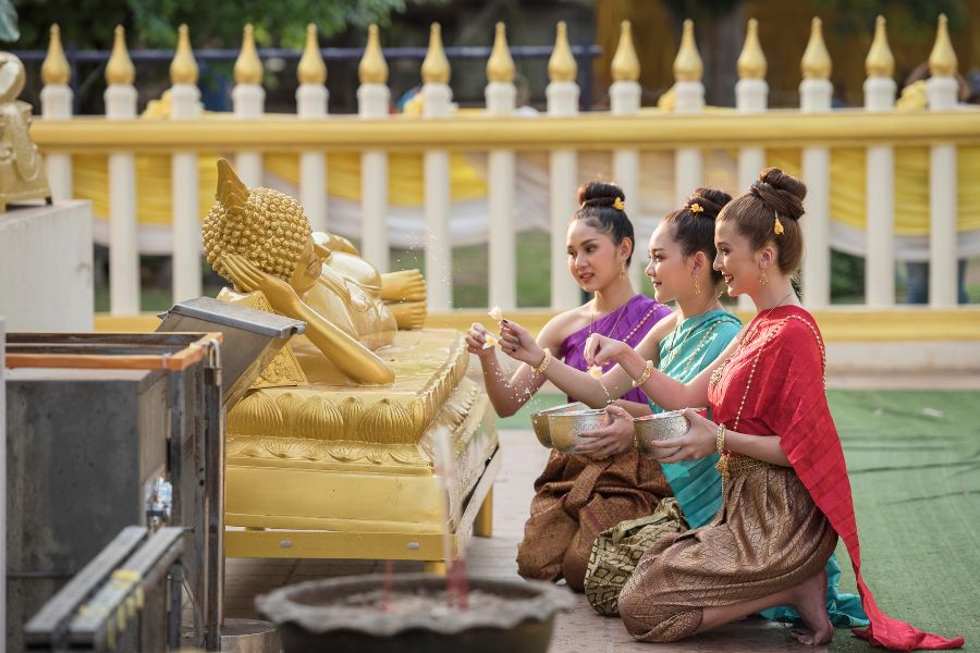 Thai people visit Thai temple during Songkran