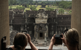 Step back in time amidst the greenery as you explore the ancient Angkor temples