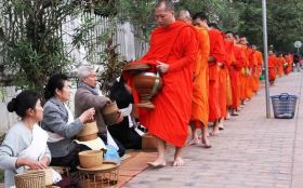 alms-giving ceremony laos