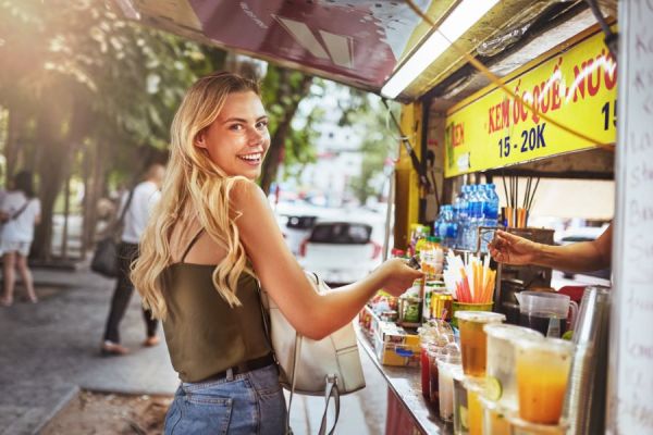 Tourists talking to a local