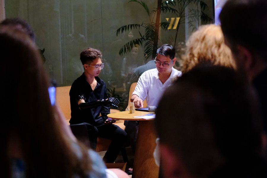 Nhat getting used to his new prosthetic arm